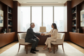 Senior business advisor in a one-on-one meeting with a CEO in a premium corporate environment